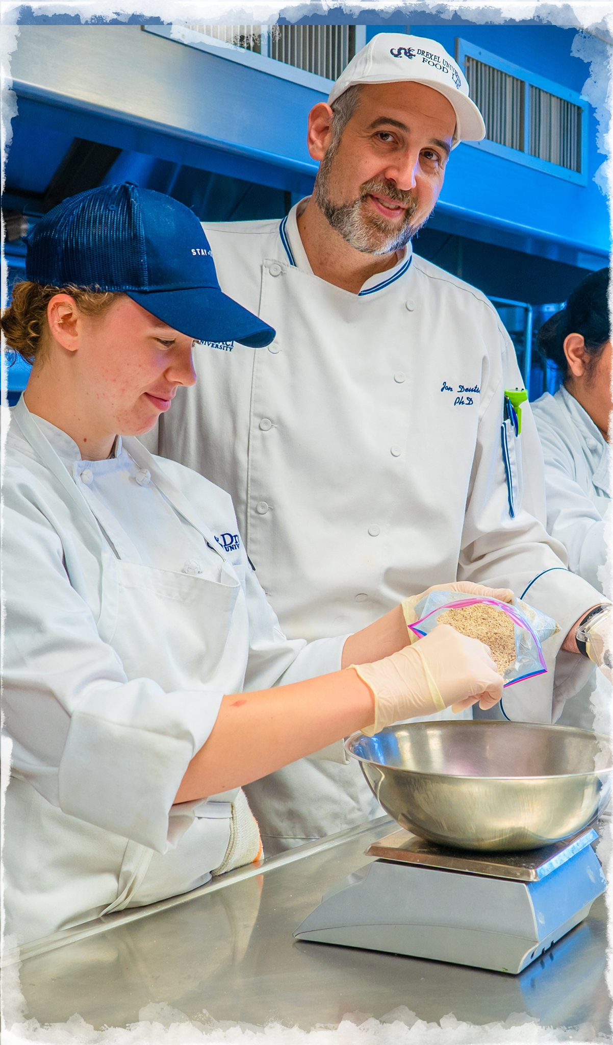 Jonathan Deutsch, PhD, CHE, CRC, working in a kitchen with Drexel University Food and Hospitality Management students.